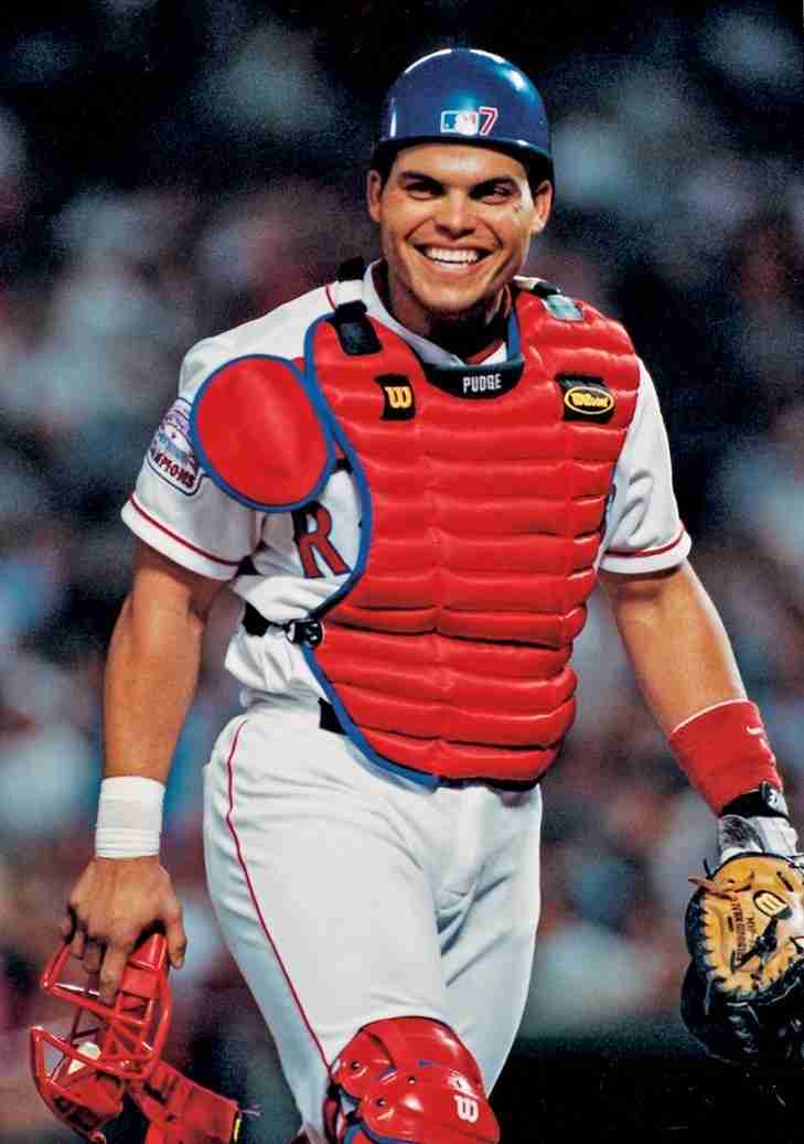 Texas Rangers Ivan Rodriguez (7) during a game from his 2001 season with  the Texas Rangers. Ivan Rodriguez played for 21 years with 6 different  teams was a 14-time All Star and