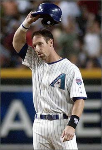 Former Arizona Diamondbacks players Luis Gonzalez, right, and