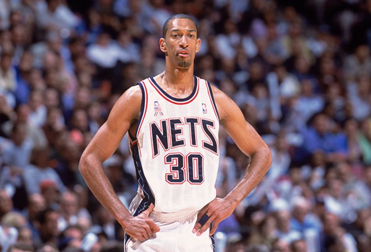 Kerry Kittles of the New Jersey Nets jams in 2 of his 18 points against the  Washington Wizards in a game won in overtime by the Nets 103-99 on March  31, 2004